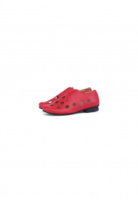 Red women's shoes with a cutout design detail 